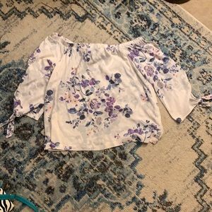 Off the shoulder floral blouse.